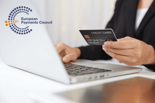 Person is reading the IBAN on their bank card